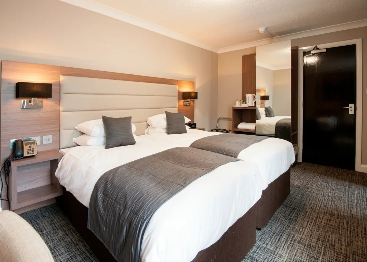 Twin room with two single beds at Riverside Hotel in Cirencester